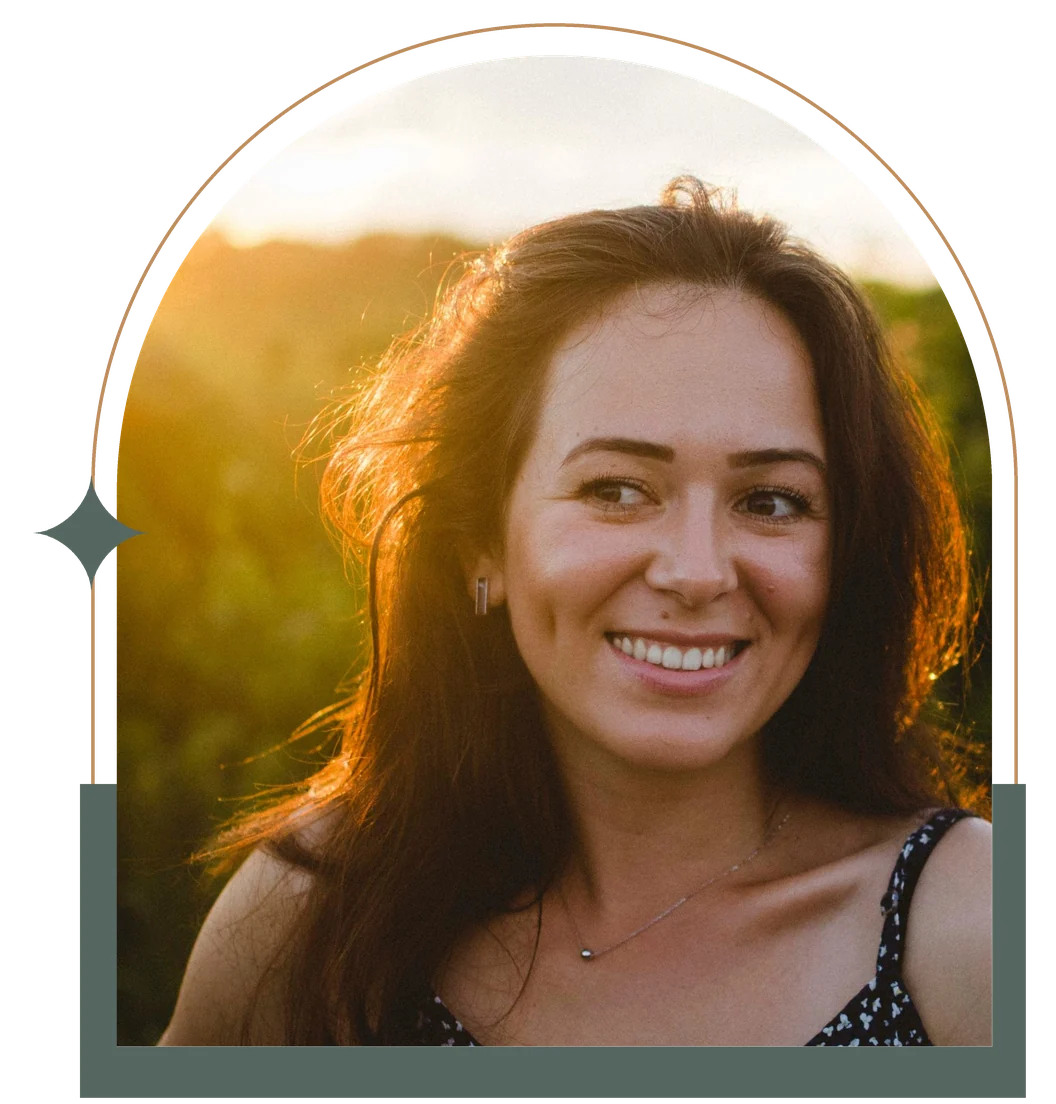 Smiling woman in warm golden-hour sunlight